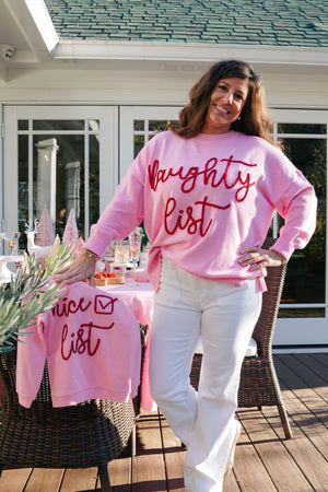 NAUGHTY LIST SWEATER