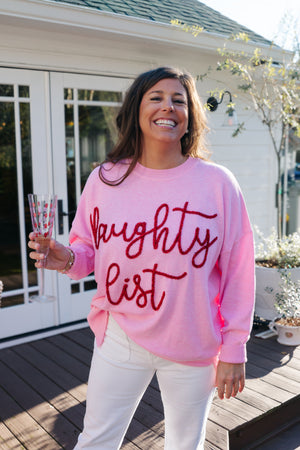 NAUGHTY LIST SWEATER