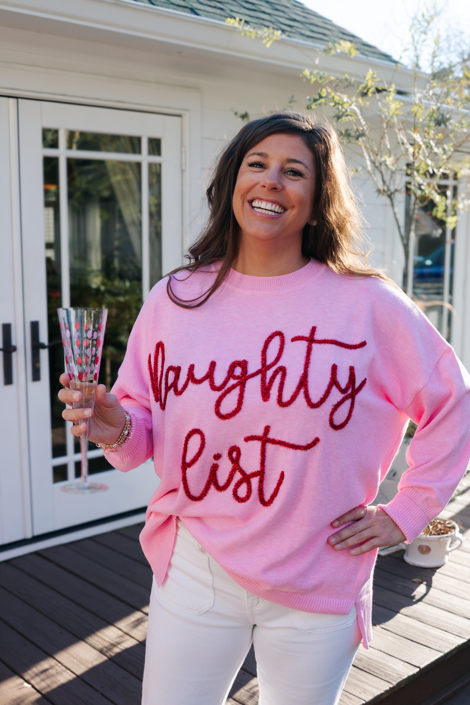 NAUGHTY LIST SWEATER