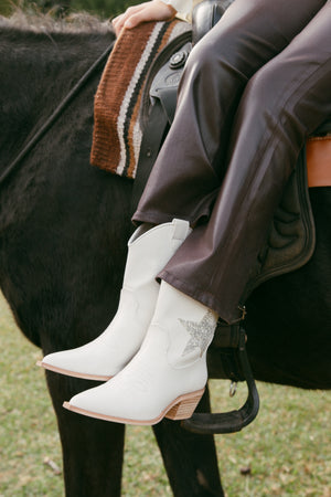 COATED SLIM BOOT JEANS
